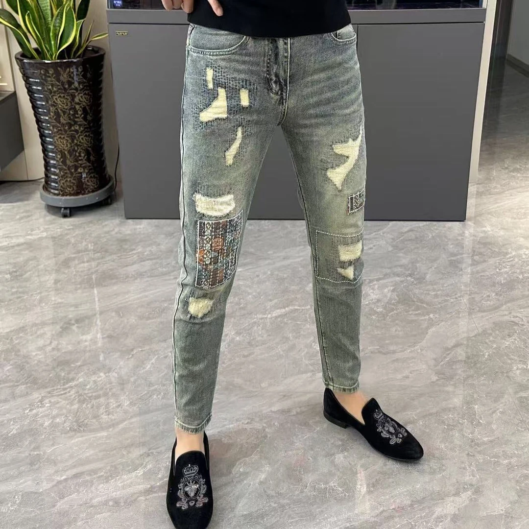 夏季时尚潮流痞帅复古蓝色做旧个性破洞补丁弹力修身小脚牛仔裤男