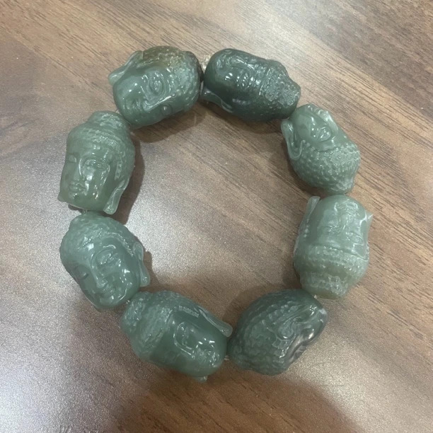 新疆和田玉且末料佛头手串