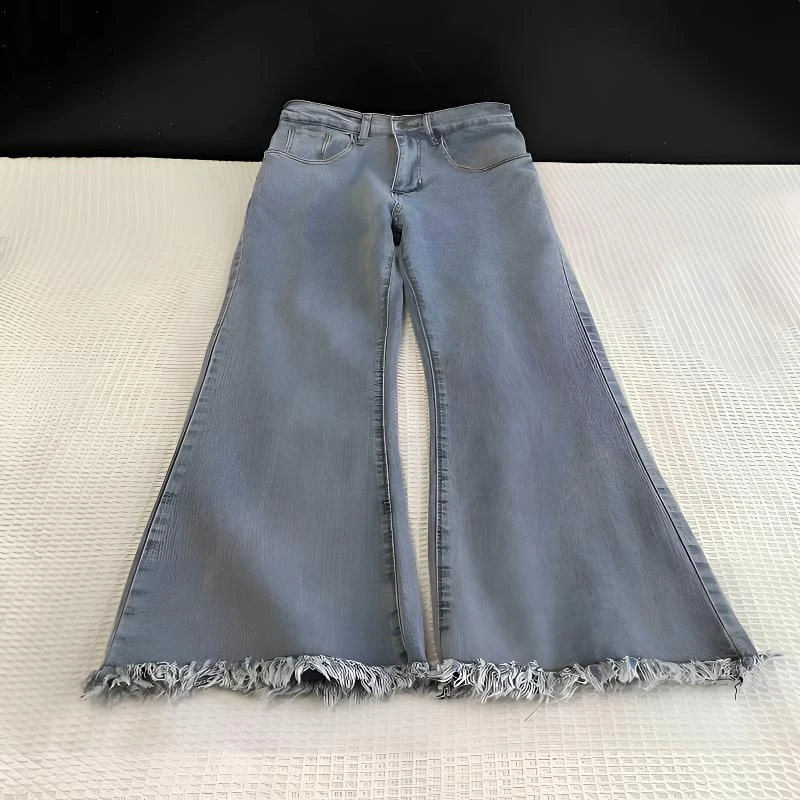 300斤流苏微喇大码牛仔裤女胖mm梨形身材宽松显瘦遮胯毛边喇叭裤