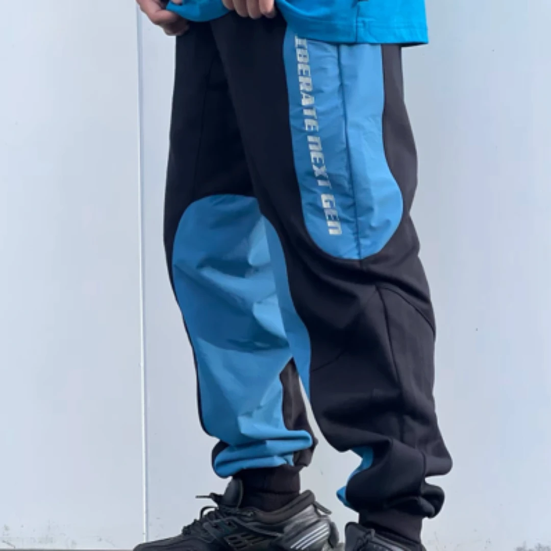 (直播）李宁LNG未来玩家系列明日世界针梭织螺纹收脚男长裤FHBC004