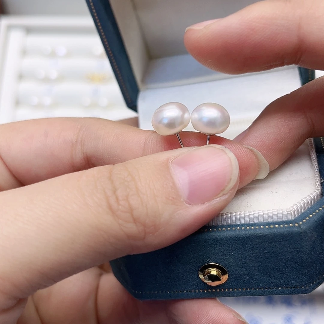 淡水珍珠耳饰银S925镶嵌余****喜