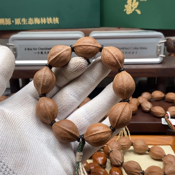 柠***团手串橄榄核1926三花
