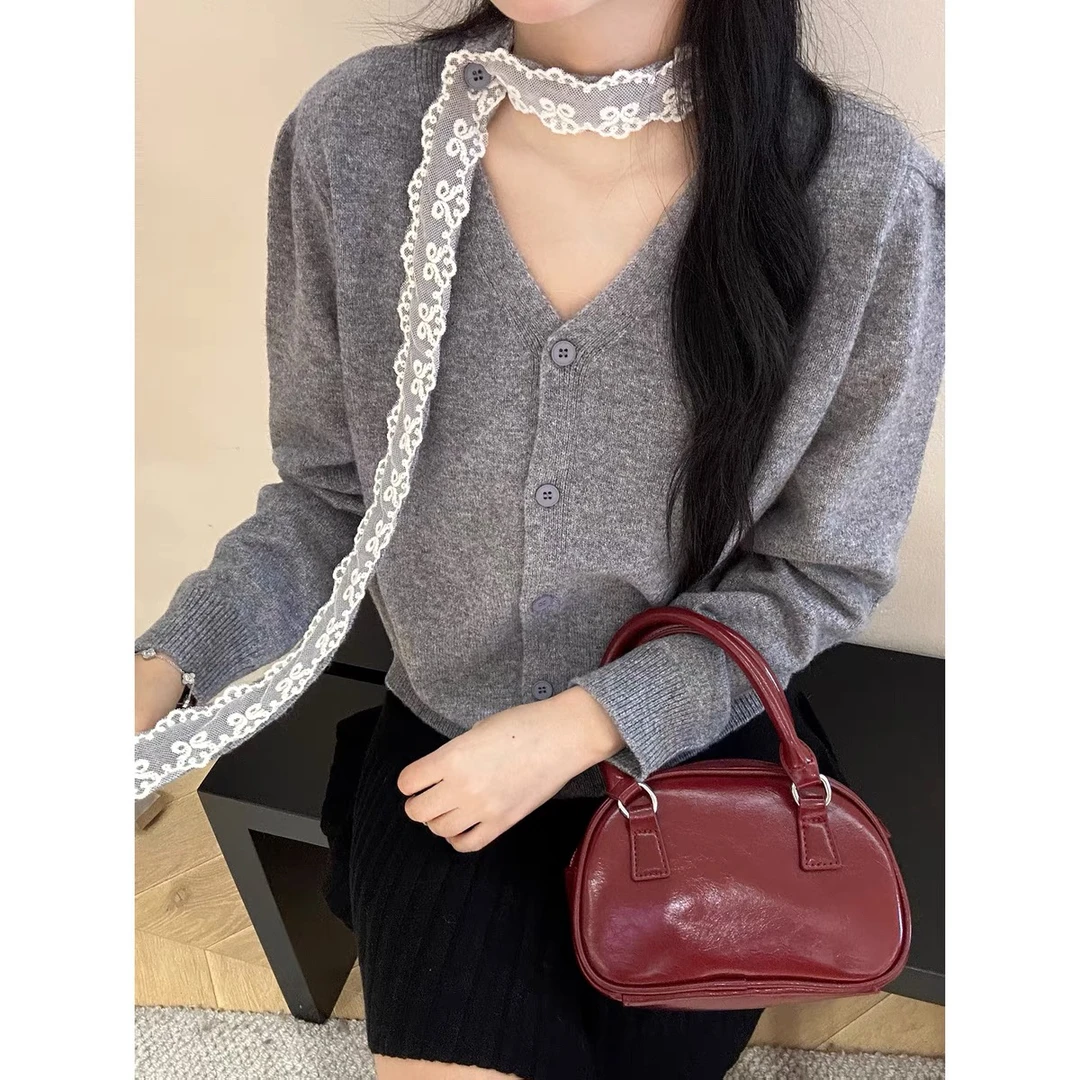 76设计感蕾丝飘带针织毛衣开衫女秋冬季新款气质百搭长袖上衣