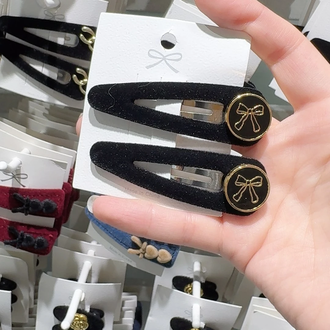 布艺非金属黑色丝绒金色蝴蝶结