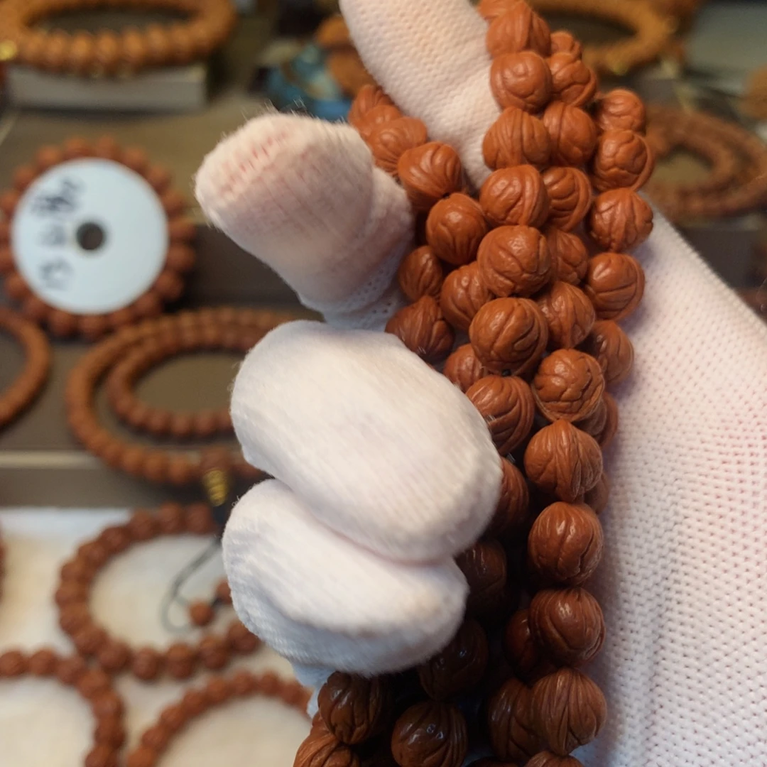 艺****手串桃核秦岭龙纹