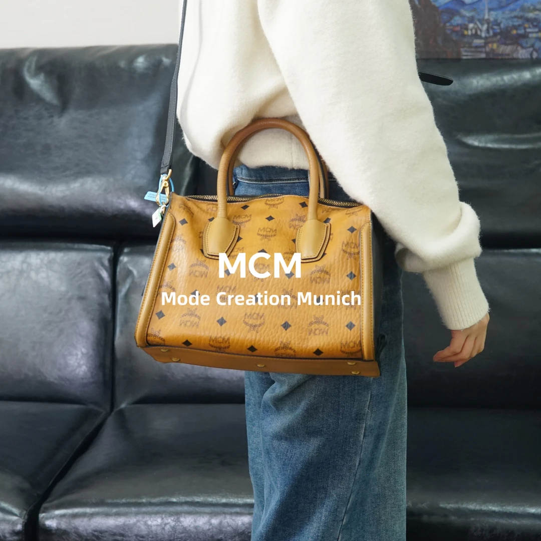 95新 MCM 干邑色枕头斜挎包/YW03610005/0005