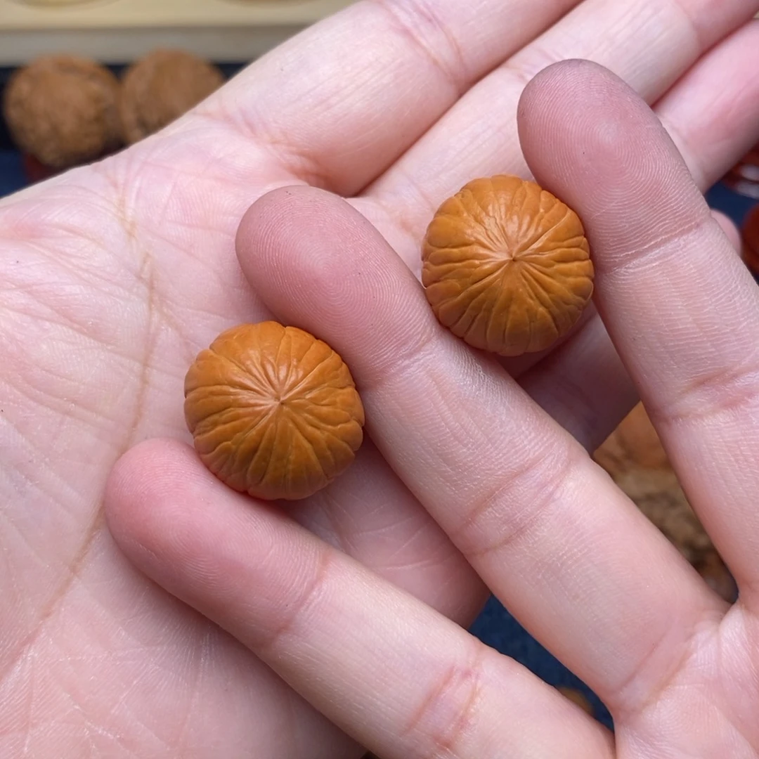 文玩核桃把件觉*手捻猴头南瓜墩