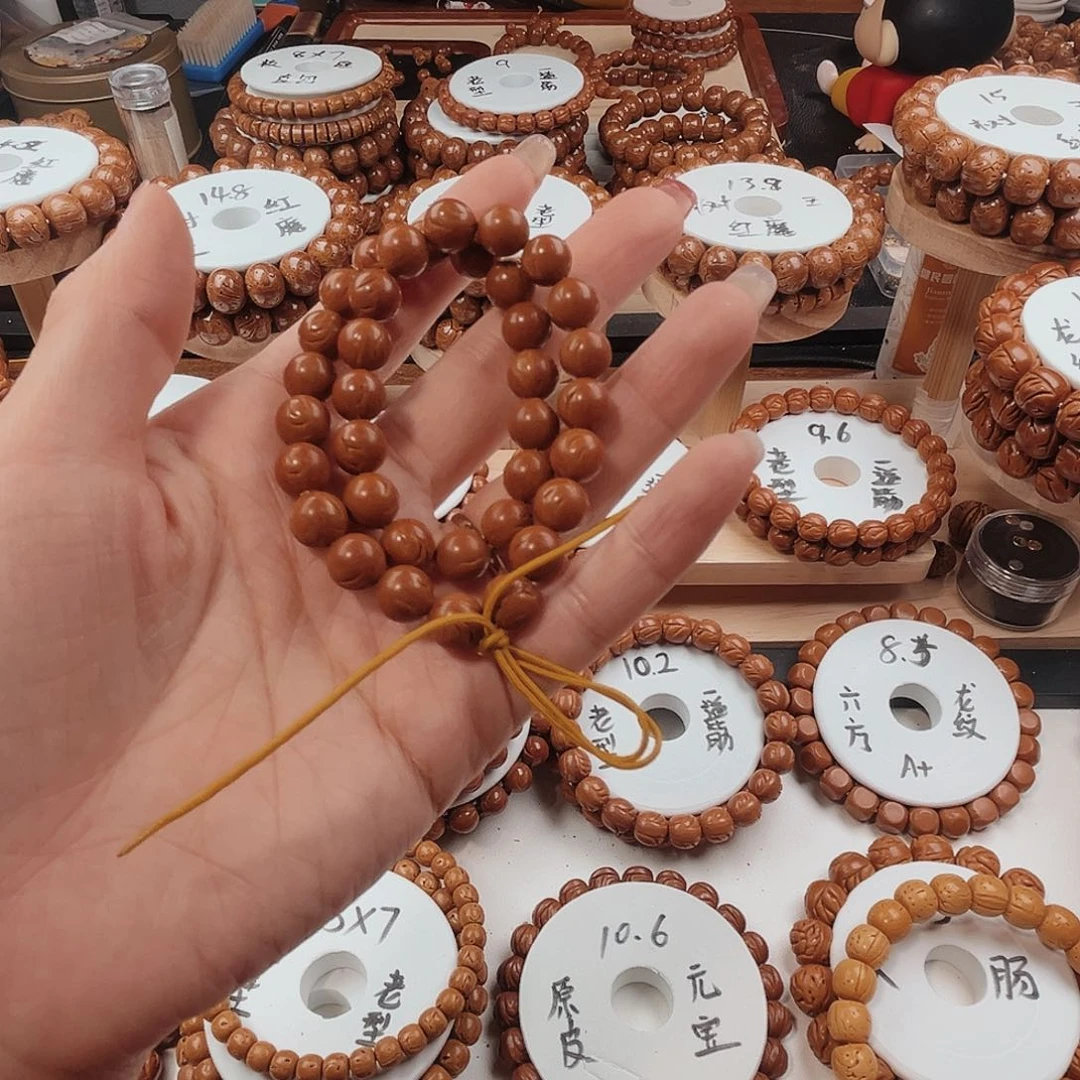 桃核手串人***?桃核光珠