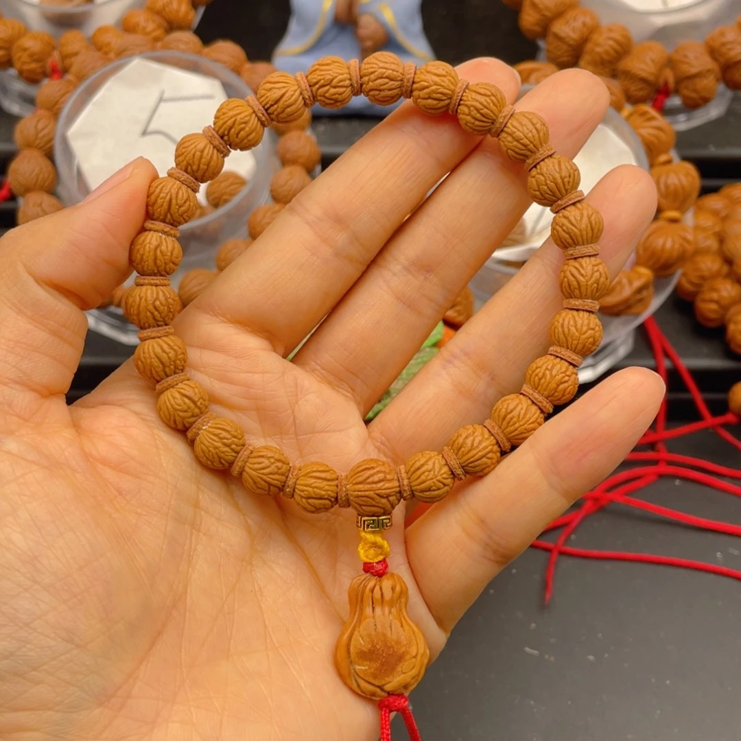 青***人桃核吊坠见健健康康平平安安9