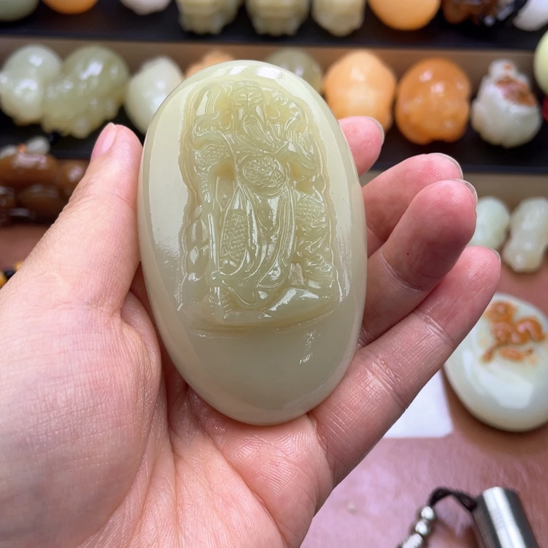 魏***三石材天然古青石手把件