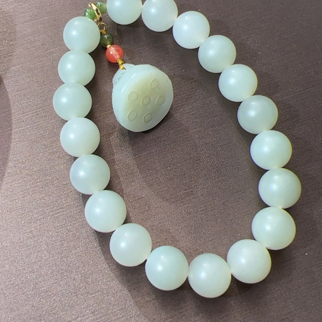 未镶嵌和田玉挂件流**岸10mm 子青白