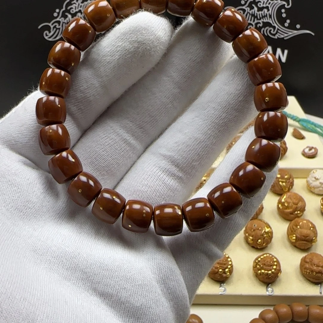 女***心吊坠猴头核桃直切镶嵌24k