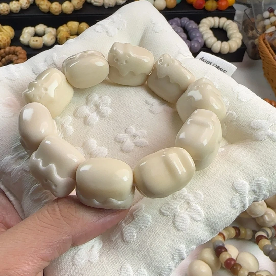 菩提根/象牙果吊坠白色巧克力猫手串一条通货