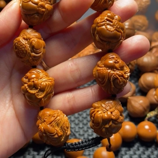 橄榄核吊坠风****7瑞兽财神