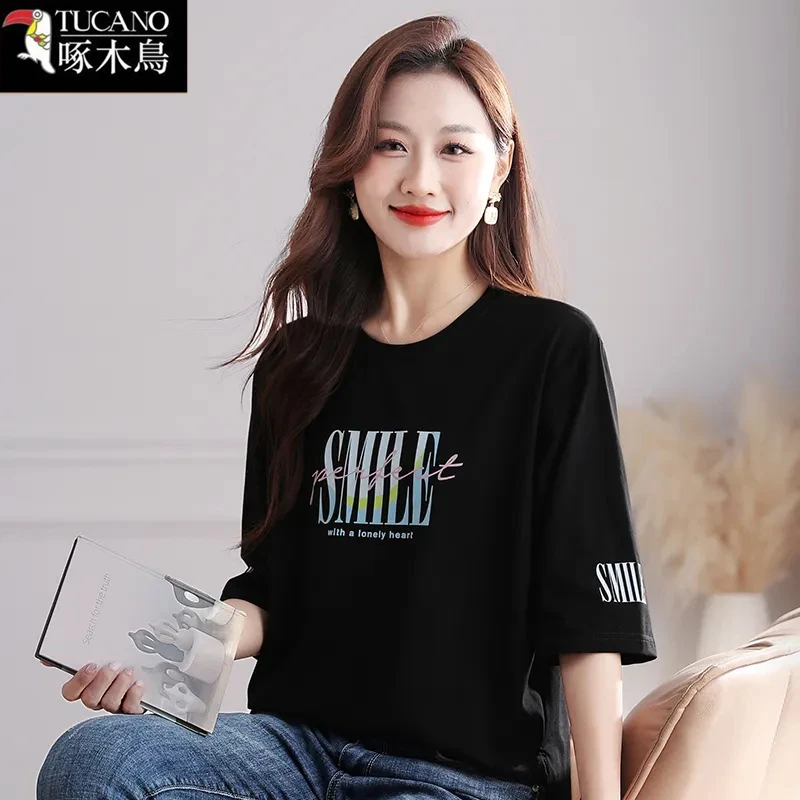 啄木鸟夏季五分袖通勤圆领T恤2025年新款大码显瘦纯色印花上衣女