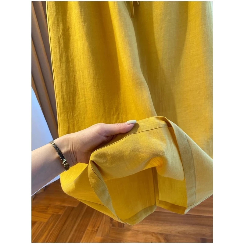 老钱风黄色高端半身裙女2025夏季新款宽松百搭中长款裙子薄款