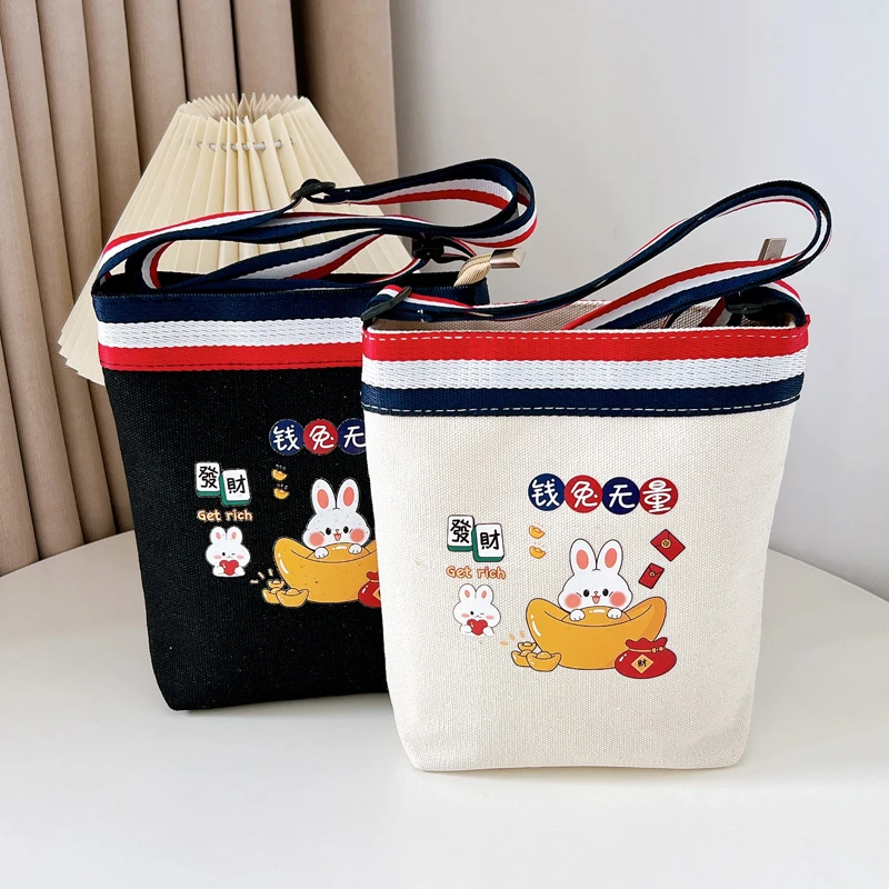 新款卡通拉链暗袋可爱风迷你式斜挎包简约百搭立体手拎包便携布包