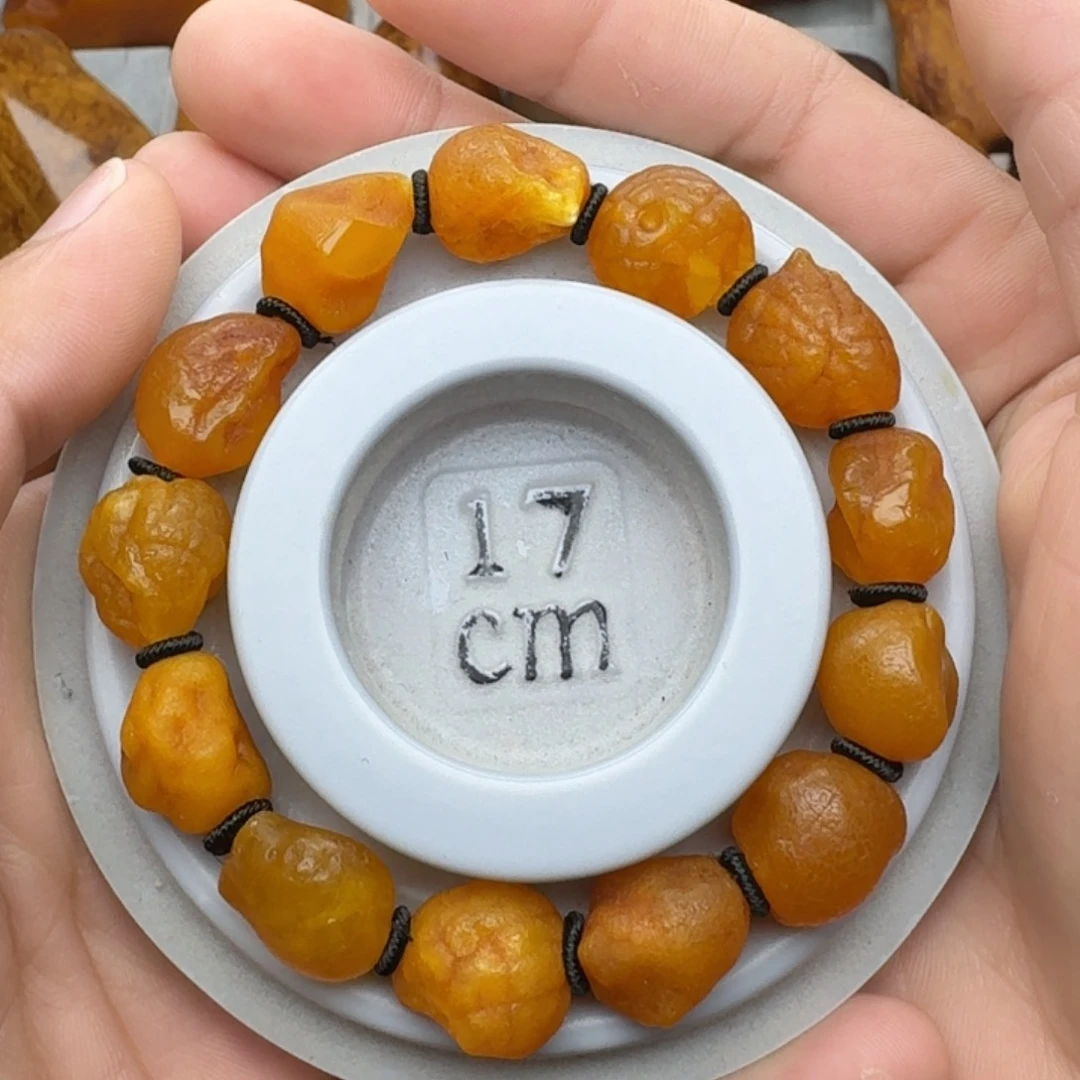 蜜蜡珠宝奇石足银镶嵌天然蜜蜡海飘手串