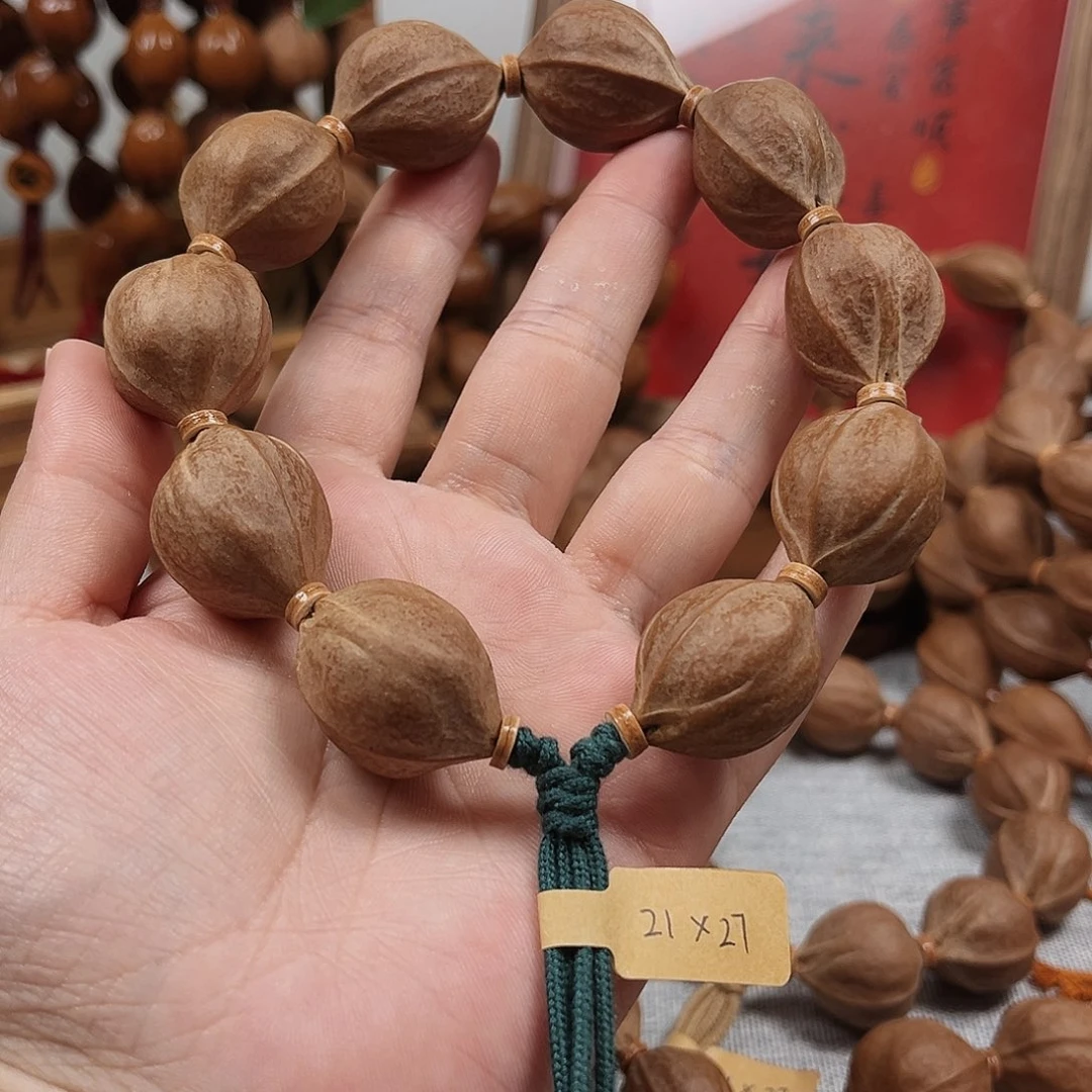 又***玩橄榄核手串梅林铁核21.27橄榄核