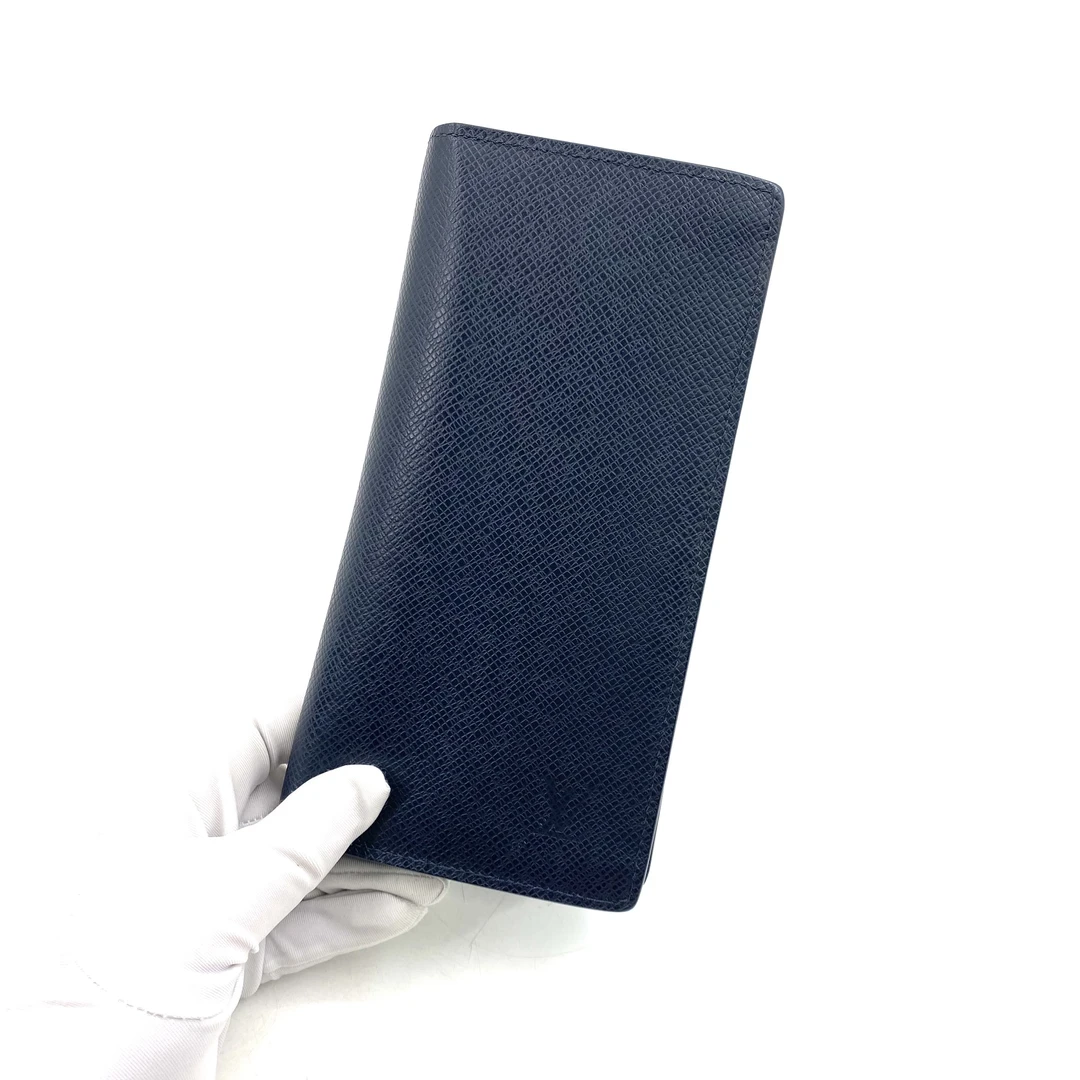 95新 LouisVuitton/路易威登 时尚藏青色全皮对折钱包尺寸19/10