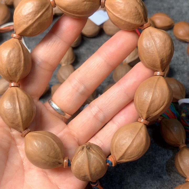 橄榄核手串/手链白****4广东梅林铁核21*28