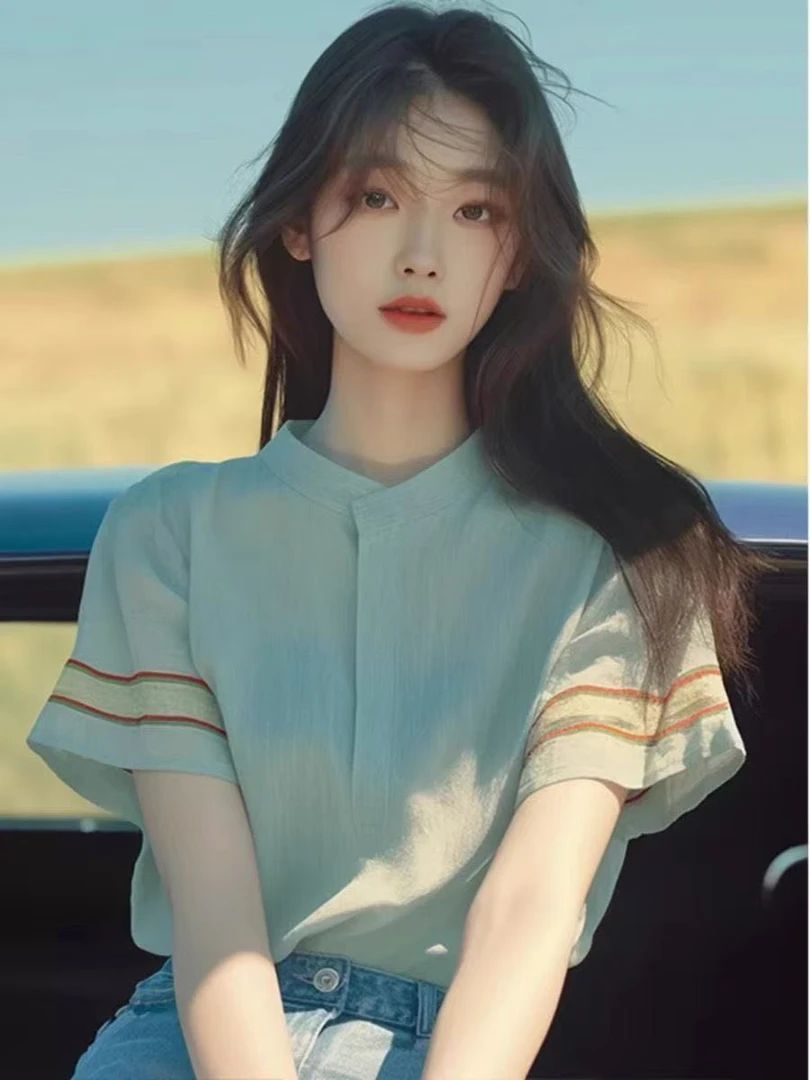 今年流行爆款衬衫女夏季高级感绿色显瘦宽松上衣条纹独特绝美小衫