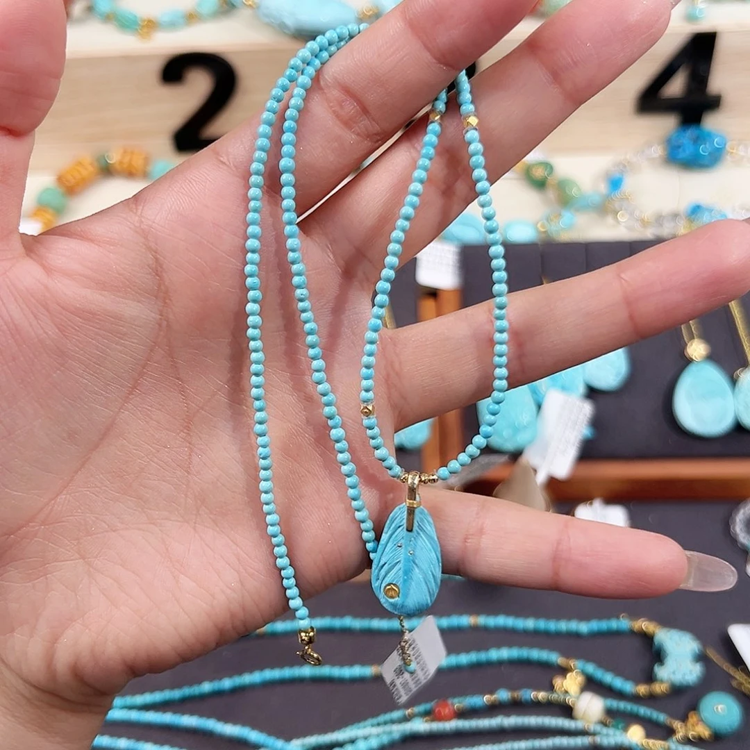 绿松石18K金镶嵌套链朱**贝羽毛套链