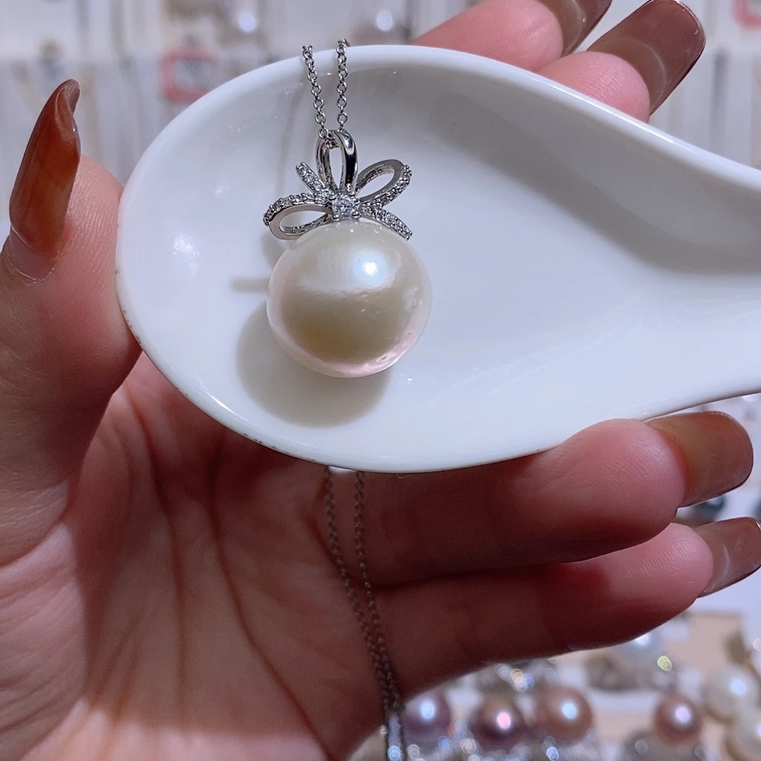 淡水珍珠吊坠(赠链)未镶嵌w16.6有瑕疵