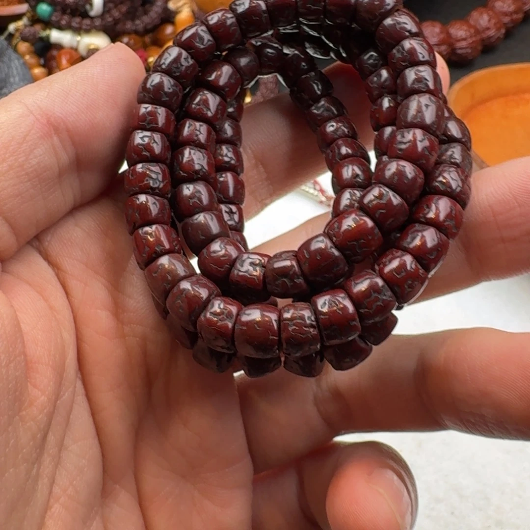 橙***爸吊坠凤眼菩提手串