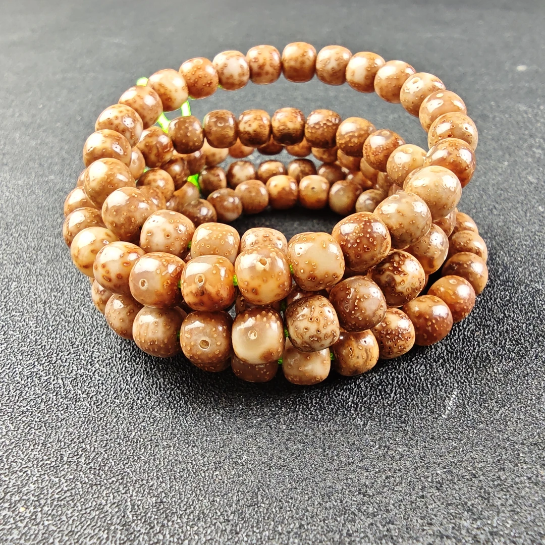 906粉皮星月菩提子桶珠6*7MM