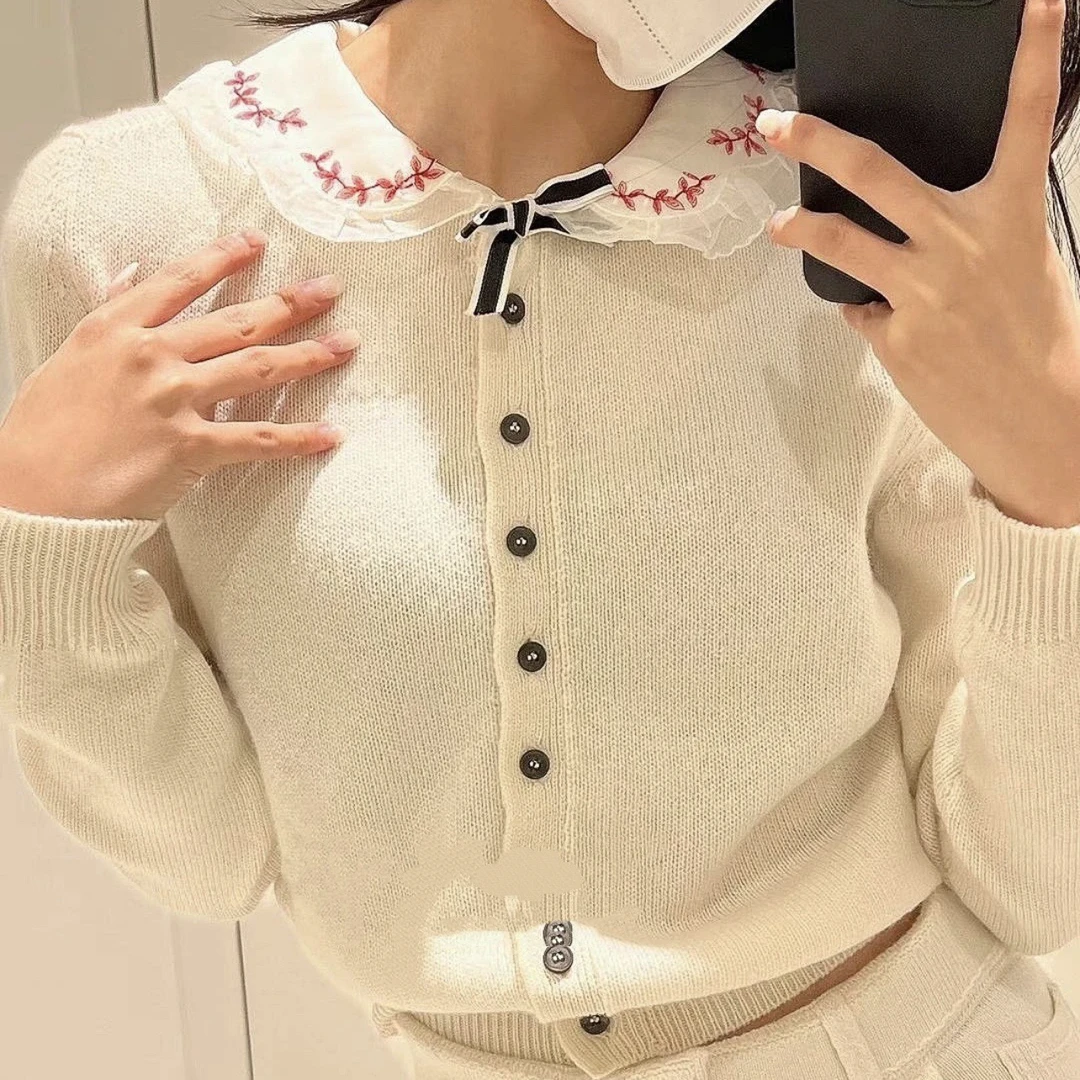 99新 MIU MIU/缪缪 vem26 蝴蝶结娃娃领单排扣开衫 42码  山羊绒