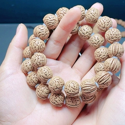 桃核吊坠华桃核手串