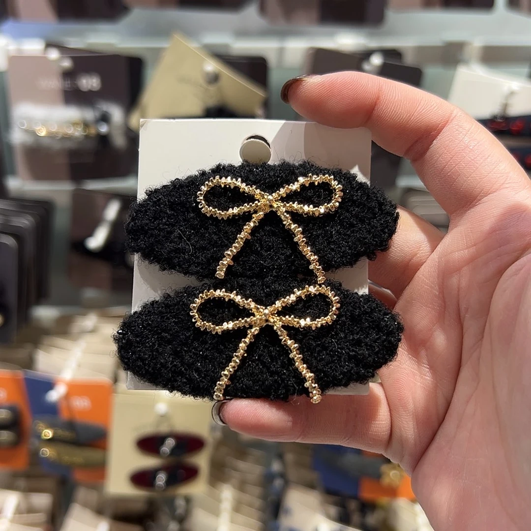 布艺非金属黑色蝴蝶结拜拜夹