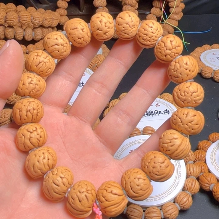 桃核吊坠校****?树王纽扣