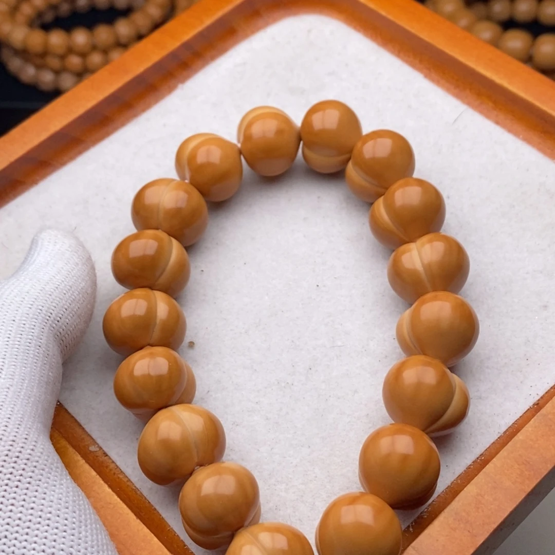 梵***弟猴头核桃吊坠聚宝盆屁桃