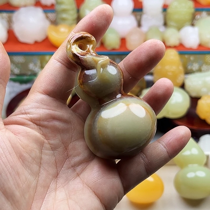 李***力石材葫芦手把摆件