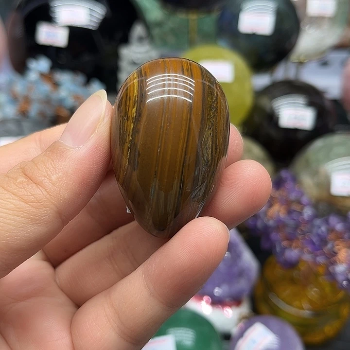 水晶珠宝半成品未镶嵌63克黄虎晶蛋