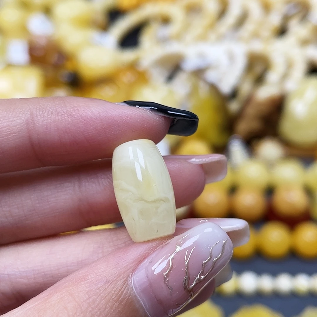 琥珀未镶嵌裸石17.7*10.2mm蜜蜡桶珠
