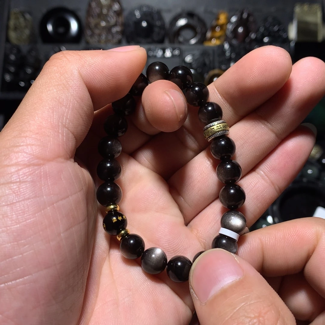 毛***虫黑曜岩未镶嵌珠宝奇石