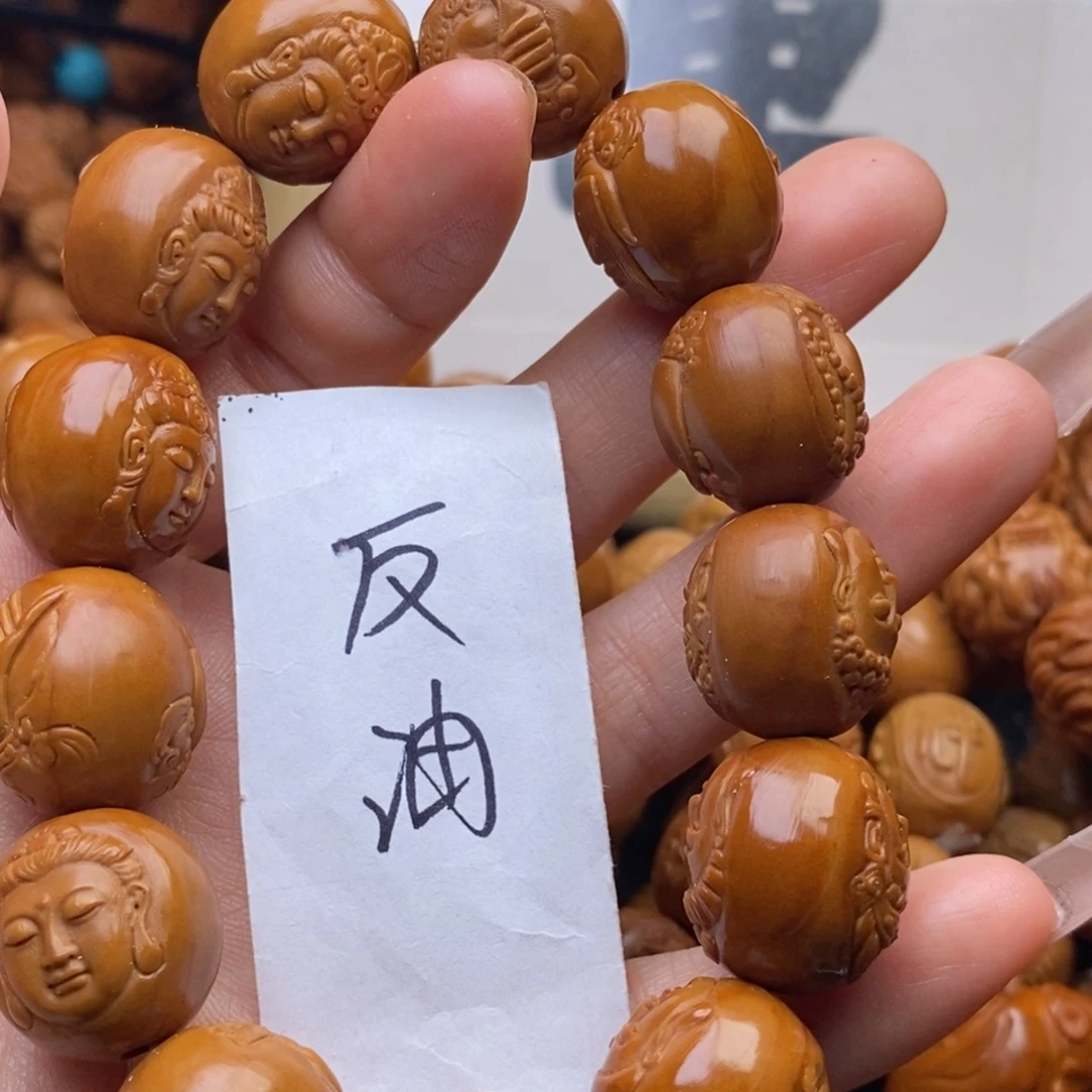 平***淡橄榄核吊坠特价观音