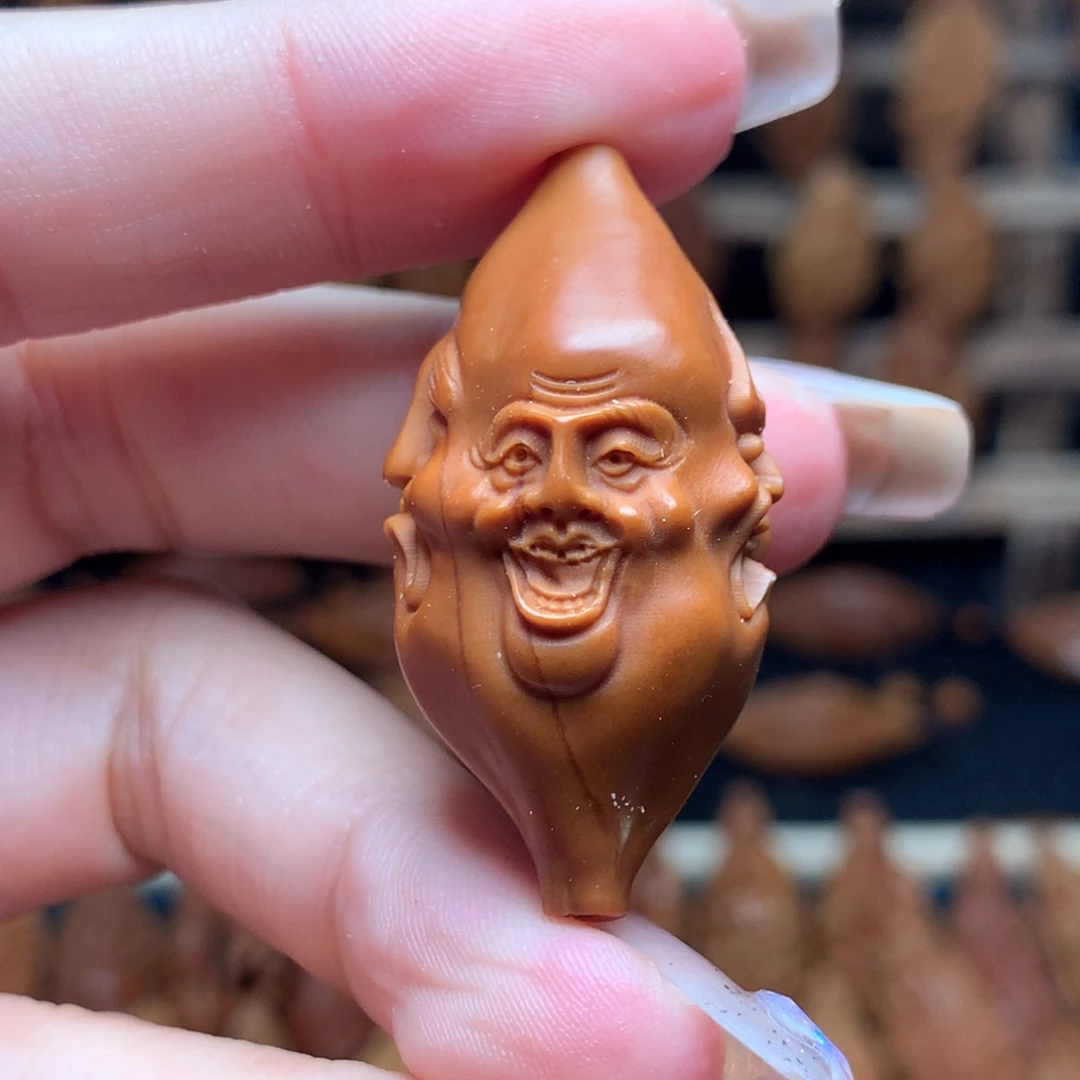把件橄榄核喜怒哀乐