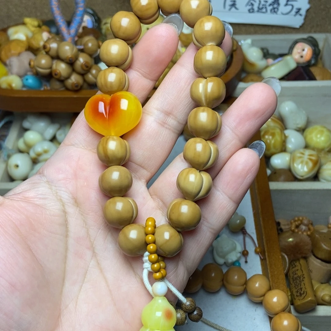 猴头核桃吊坠珂基手持微微瑕整套不退换