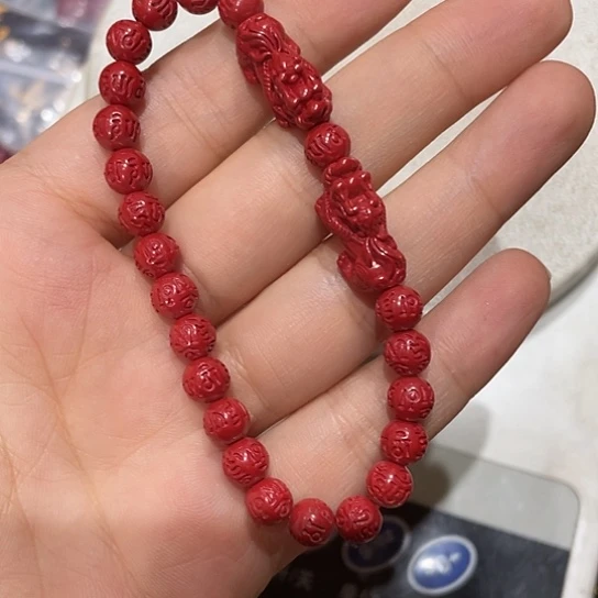 你***5天然辰砂手串的设计