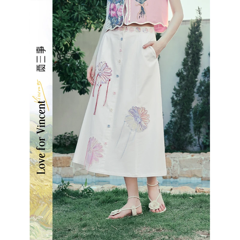 两三事梵高文艺半糖雏菊2025夏季新款流苏绣花彩色纽扣A字半身裙
