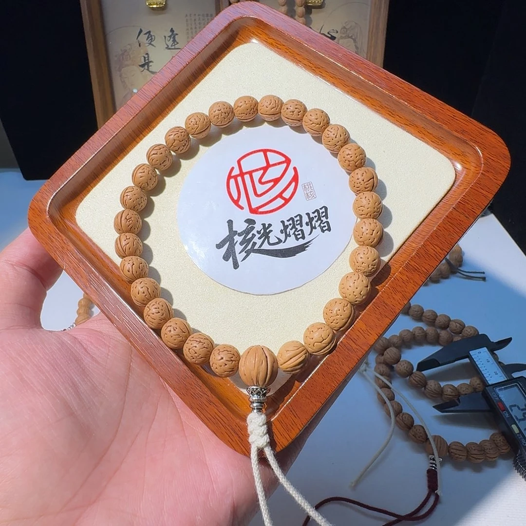 6***i桃核吊坠野生肌肉小黄桃
