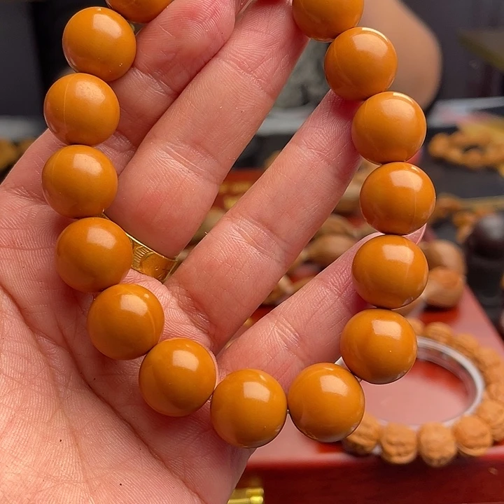 橄榄核吊坠猴头手串