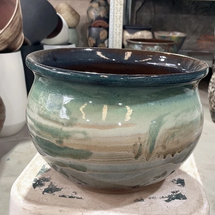 紫砂花盆正品口25高18。z z z