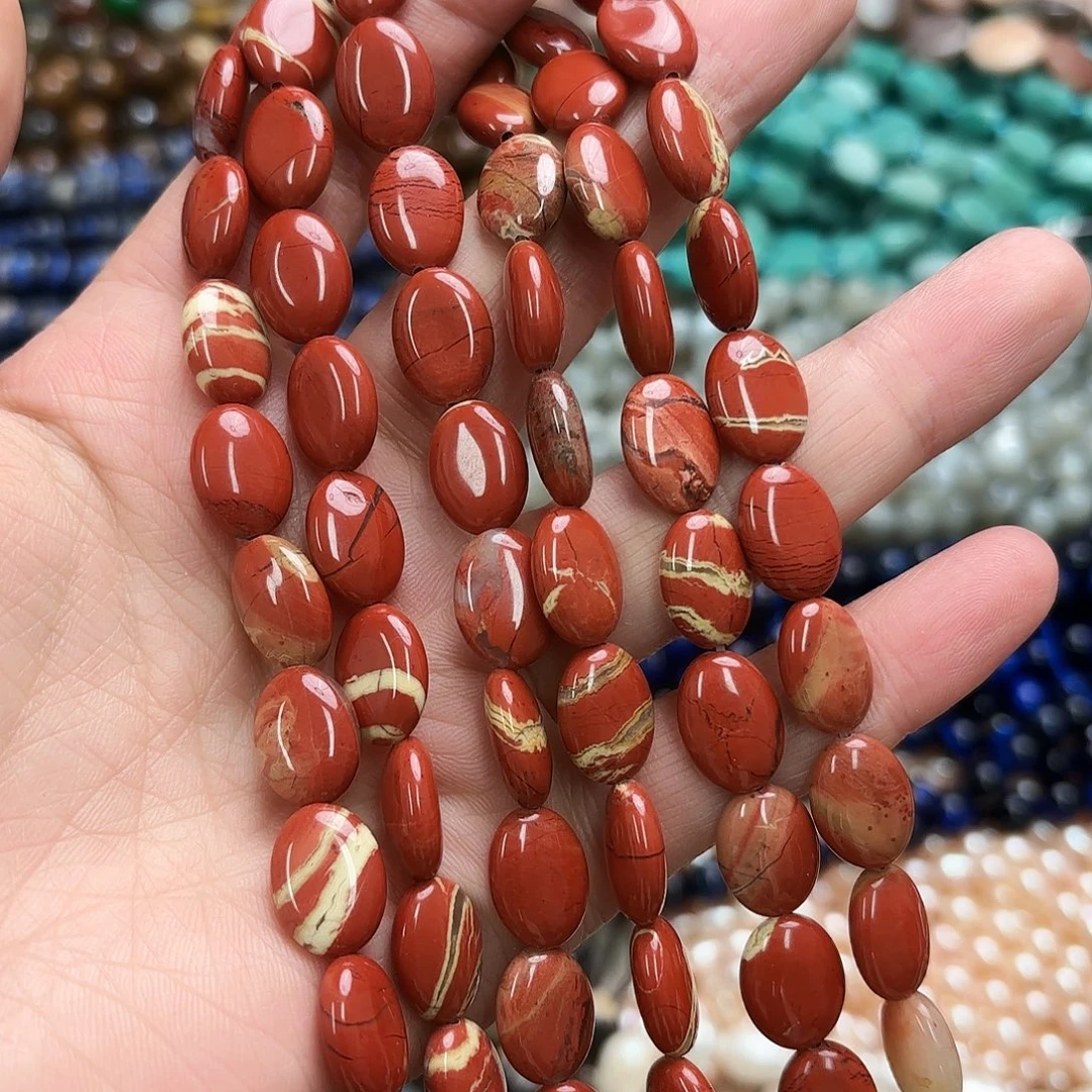 玛瑙/玉髓未镶嵌珠宝半成品10×14花红石蛋型一条