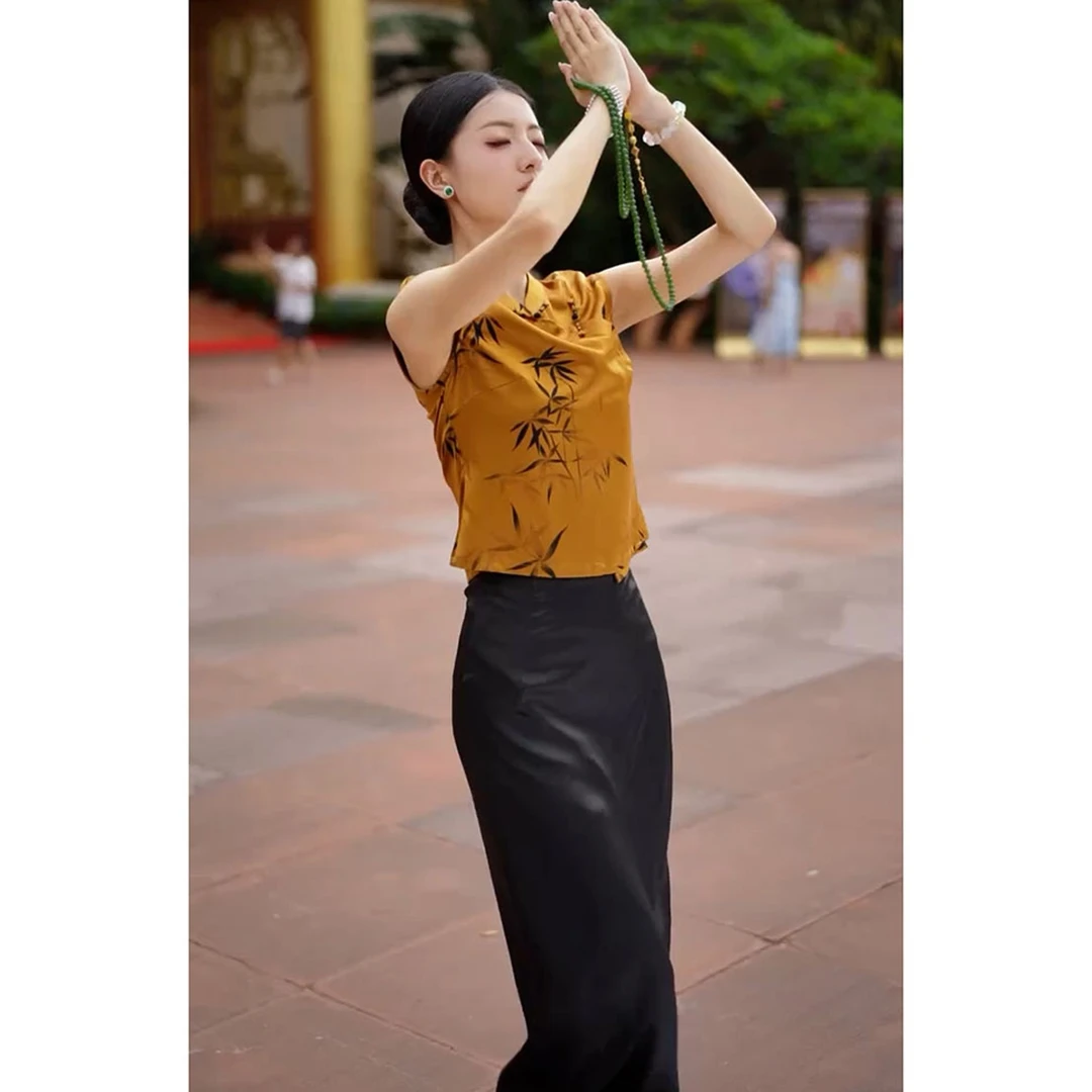 今年流行新中式国风茶里茶气别致上衣轻奢高级感黄色印花衬衫女秋