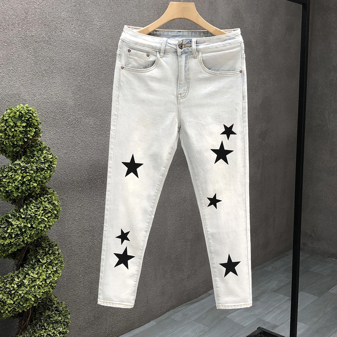 潮牌五角星印花牛仔裤男士春秋季新款修身微弹做旧韩版百搭裤子男